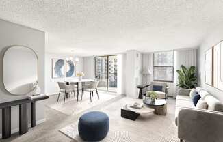 A modern living room with a dining table and chairs.