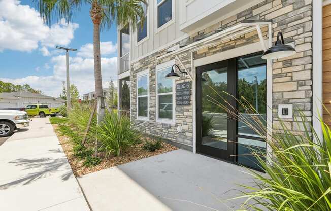the front of the building with glass doors and a sidewalk at Drift, Daytona Beach, FL, 32117