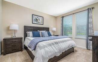 Bedroom with cozy bed at The Oasis at Crosstown, Orlando, Florida