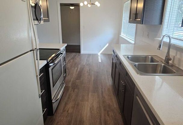 Newly remodeled 1488 sq ft, 3 bedroom, 1 bath ranch style house with fenced in back yard