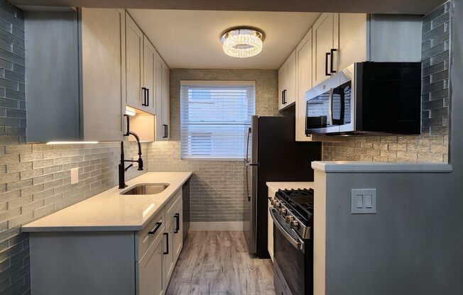 **One Bedroom Located in Clayton***Brand New Rehabbed Apartment***In Unit Washer/Dryer + Covered Parking***