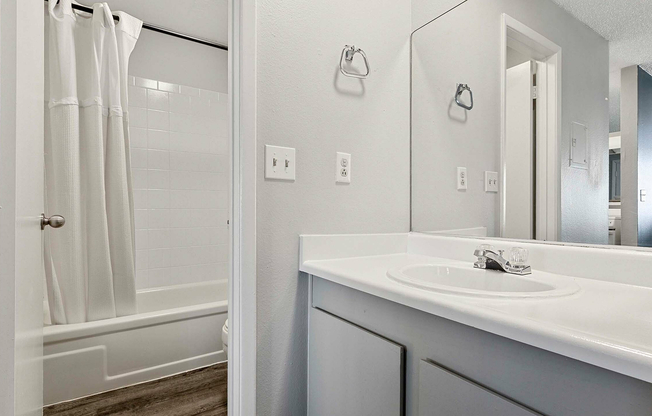 Experience modern convenience and style in this thoughtfully designed bathroom.