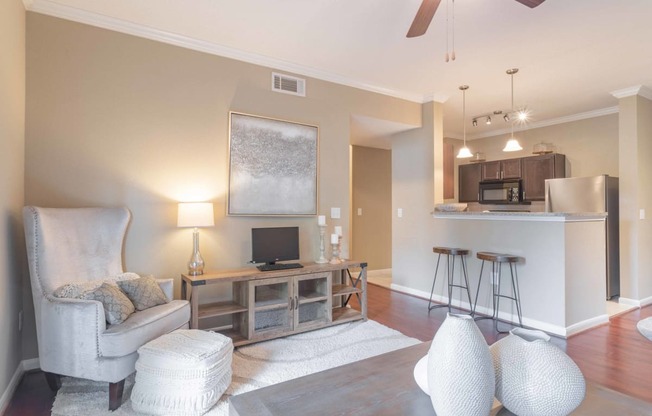 a living room with a couch and a chair