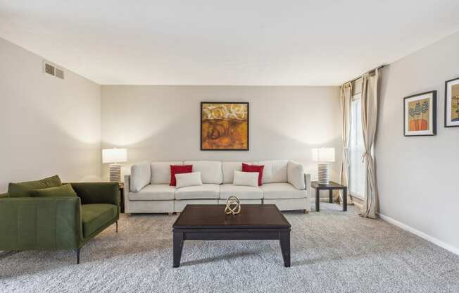 a living room with a couch and a coffee table