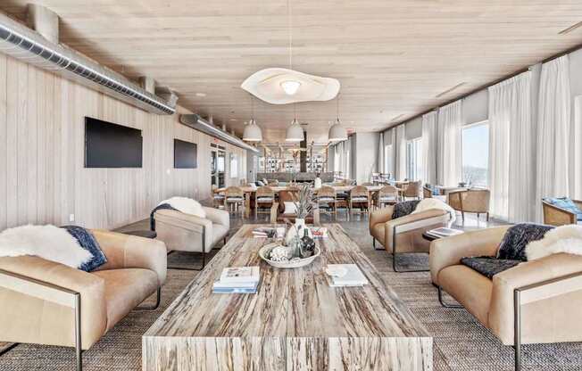 A modern living room with a wooden floor and furniture.