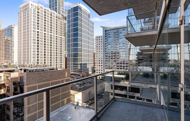 views of the city from the balcony of a high rise condo at One 333, Chicago, 60605