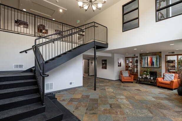 a staircase leads up to the second floor of the home