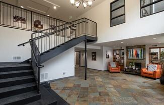 a staircase leads up to the second floor of the home
