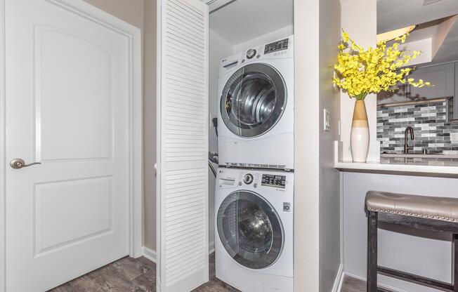 Laundry at Enclave at Town Square Apartments in Chino, CA
