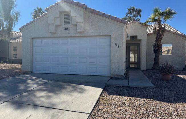 Single Story 3 bedroom with Fresh Paint & New Flooring + Blinds Inside! Owner pays HOA dues. All appliances too!