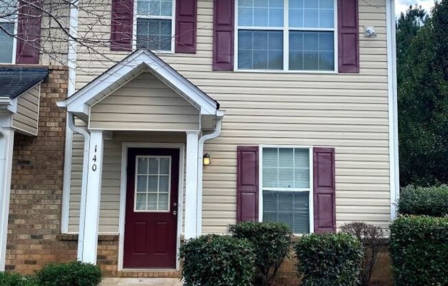 Welcome to this spacious end unit in Atlanta, GA! Great for Roommates!