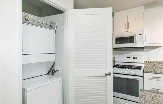 Washer and dryer on the side of the refrigerator
