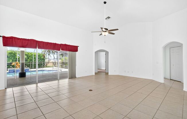 Annual unfurnished 4/2 pool home with 3 car garage in the Southwest Cape