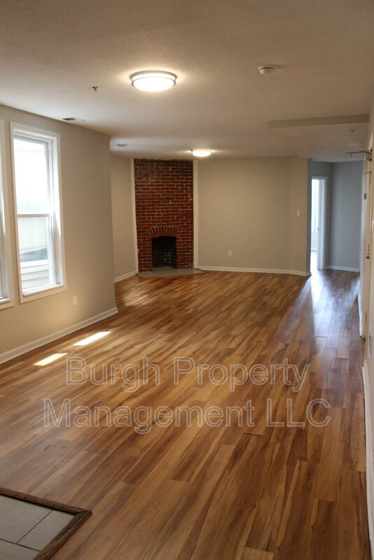 114 W 8 AVE