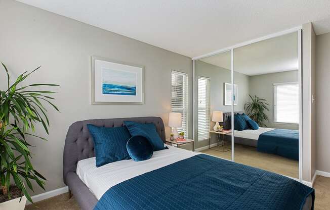 furnished bedroom interior at OceanAire Apartment Homes, Pacifica