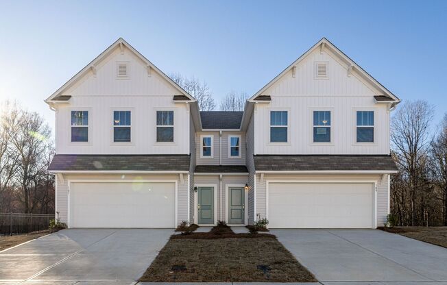3 Bedroom Townhome with 2 car garage near shopping and  I-40 & I-77 Interchange
