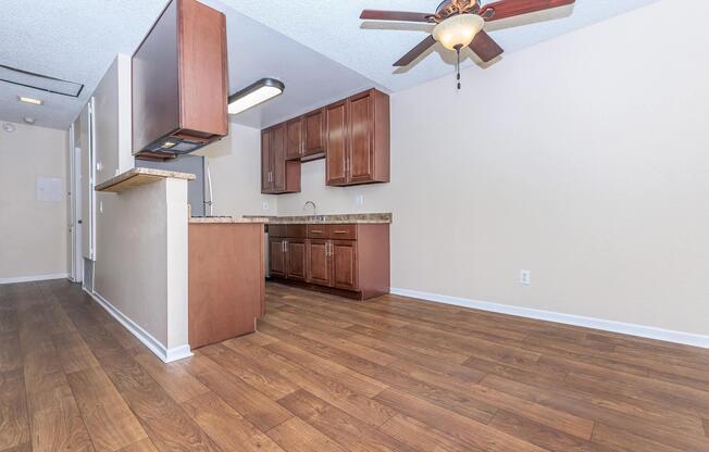 a kitchen with a wooden floor