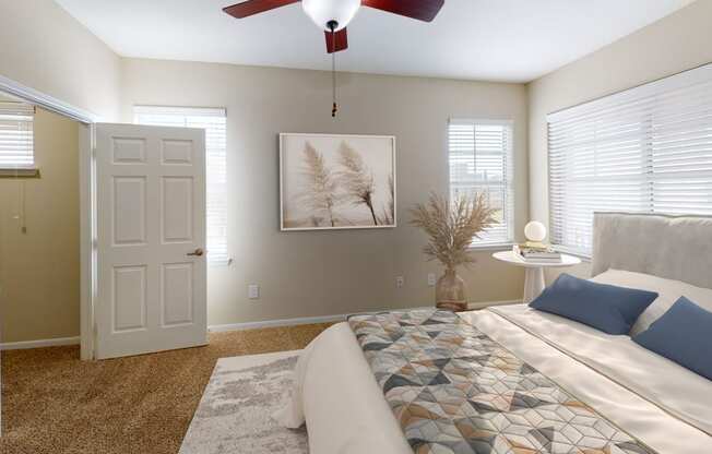 Spacious bedroom with hardwood style flooring