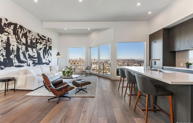 **PRE-MARKET OPPORTUNITY** Glen Park: Impressive Top Floor Unfurnished 2 Bed 2 Bath with Private Deck, Views, Garage Parking, & In-Unit Laundry