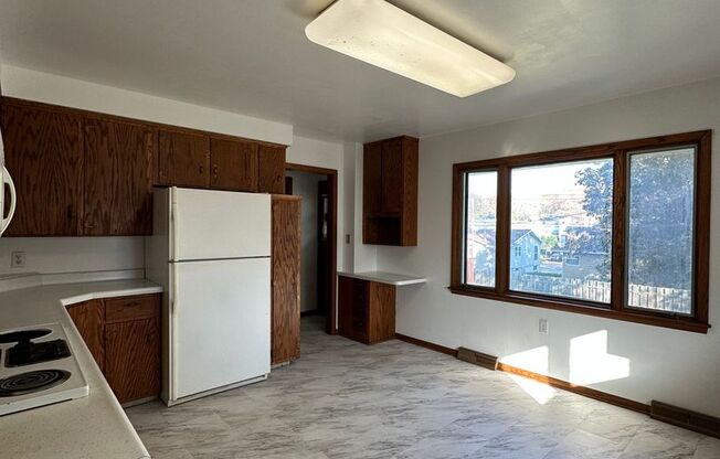NW, Rochester, House for rent with hardwood floors throughout three bedrooms on the main floor. Dogs welcome!