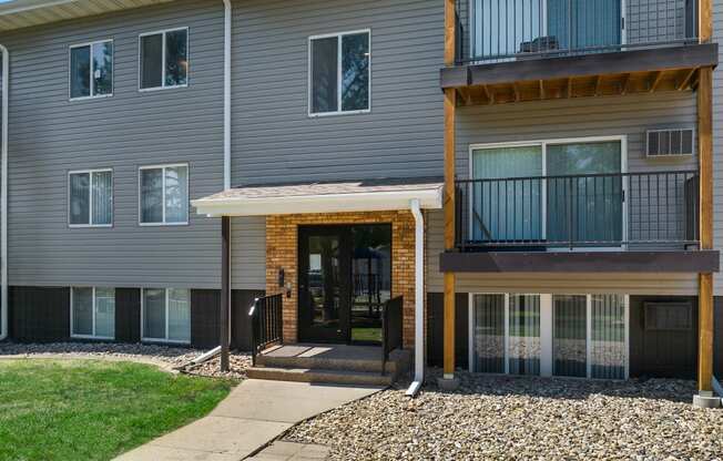 a building with a front porch and a glass door