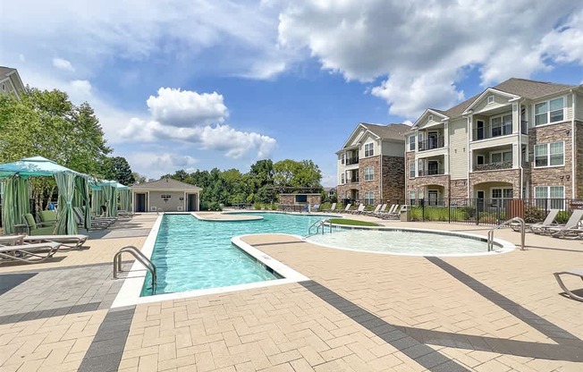 Pool with swim lane and cabanas