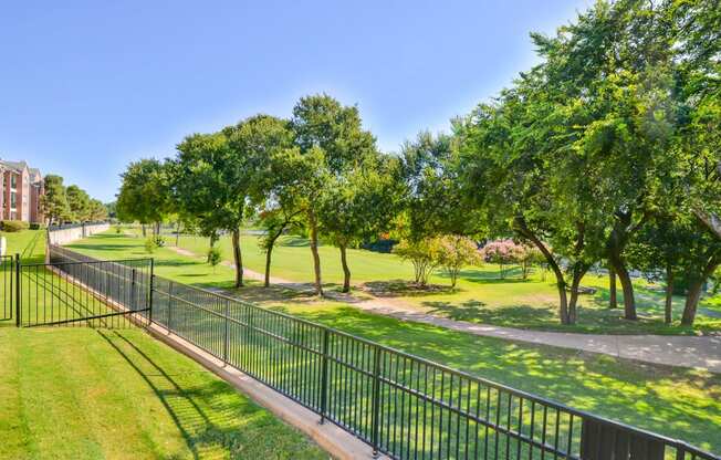 Gated community with lush trees and walking paths Turnberry Isle apartments in Far North Dallas, TX, For Rent. Now leasing 1, 2 and 3 bedroom apartments.