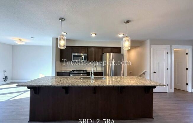 Modern Open Concept 3 Bedroom Home with Balcony and Attached Garage