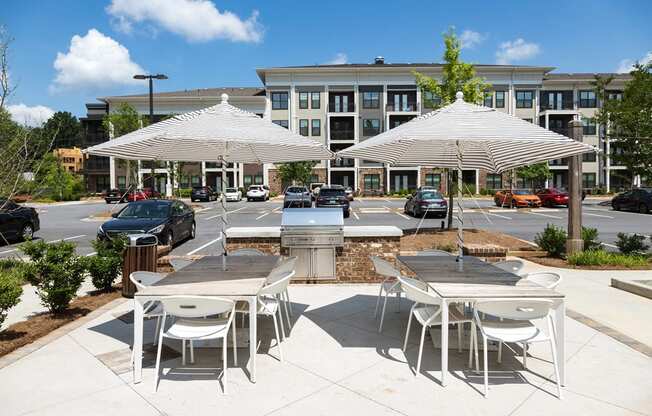 Gorgeous Modern Pool with Sunshelf and Lounge Chairs for Relaxing at Echo at North Pointe Center Apartment Homes, Alpharetta, GA 30009