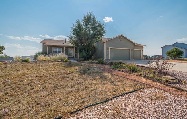 Beautiful Rancher in Woodmen Hills on over half an acre!