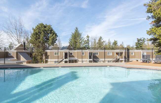 the swimming pool at woodland park apartments