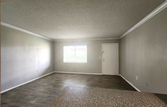 Ground Floor End-Unit; New Paint; All-Tile Flooring; Pool; Water/Sewer INCLUDED in the Rent!