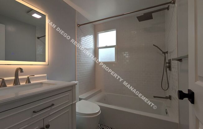 Beautifully Renovated 3BR/2BA Home with Sunroom & Spacious Backyard in Quiet Neighborhood