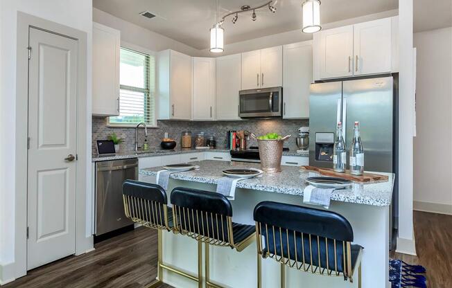 Berewick Pointe European-Style Kitchen With Breakfast Bar at North Carolina Apartment Rentals