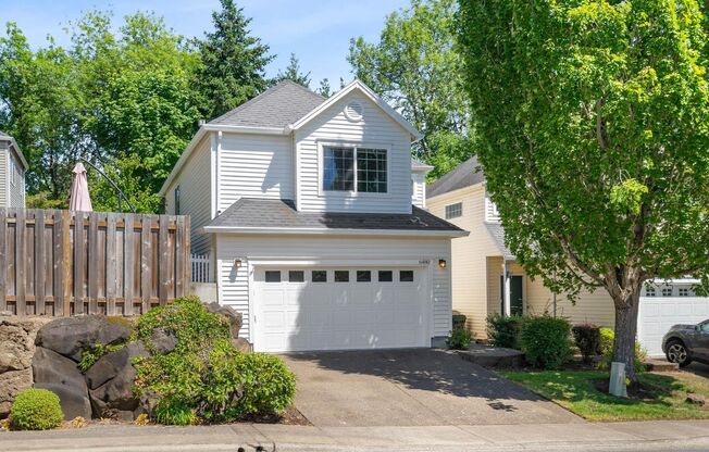 Spacious 3-bdrm/2.5-bath Bethany home w/ a cozy vibe—Private back yard, A/C, 2-car garage, fab location