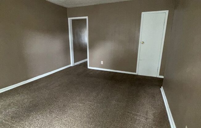 Charming 2-Bed End Unit in Quiet Quadplex- Move In Ready!