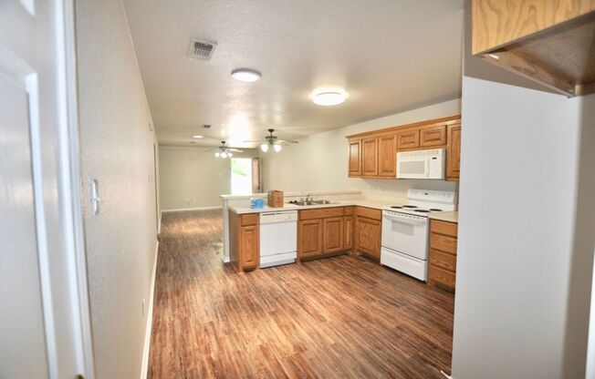 FOR LEASE! Nicely Remodeled 3 BR - 2 BA Brick Duplex With a 2 Car Garage in Weatherford