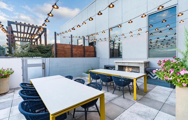 Host rooftop dinners at Modera Old Ivy, where firelit tables and skyline views set the scene just minutes from Buckhead.