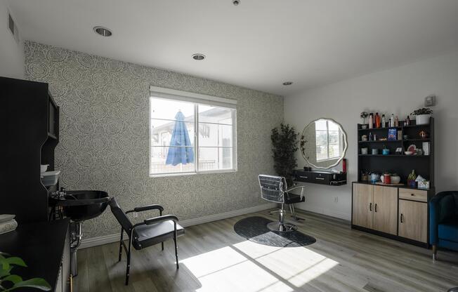 a living room filled with furniture and a large window