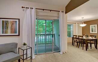 Island Park living room and balcony Apartments in Kent, WA