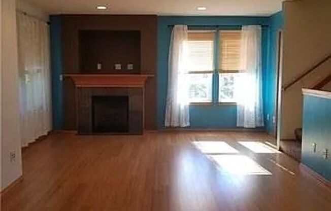 Spacious 4 Bedroom Townhome with Private Fenced Yard!