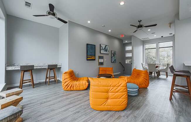 clubhouse with an orange couches