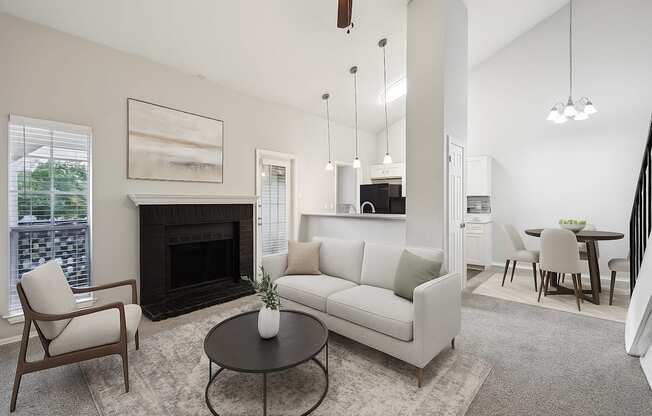 A living room with a fireplace, a couch, a chair, and a coffee table.