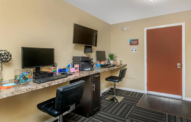 a room filled with furniture and a flat screen tv