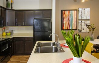 Granite Countertop Kitchen Island at Talavera at the Junction Apartments & Townhomes, Midvale, UT, 84047