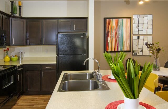 Granite Countertop Kitchen Island at Talavera at the Junction Apartments & Townhomes, Midvale, UT, 84047