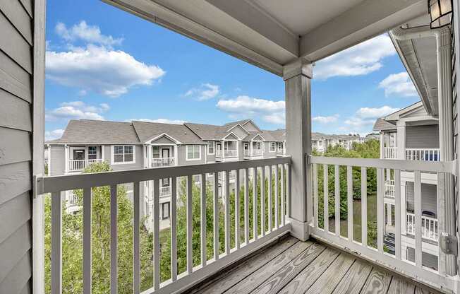 the view from the deck of a home with a balcony