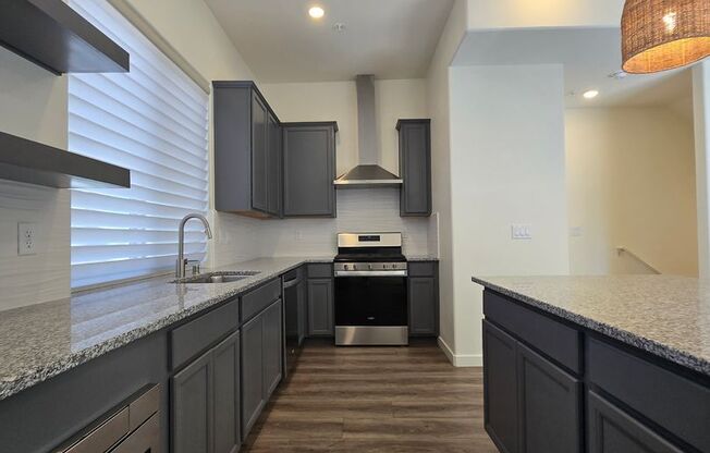 City Life with the Sounds of Nature! Beautiful Two Bedroom Townhouse Available Now!