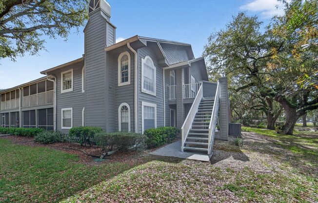 Lakeview corner condo in the desirable Raintree Village community! This 3-bedroom, 2-bath second-floor unit