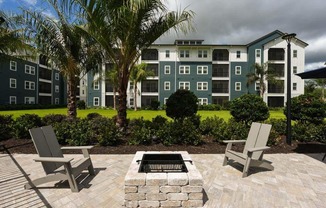 Fire Pit with Two Chairs in Front at Fountainhead, Jacksonville, FL, 32258